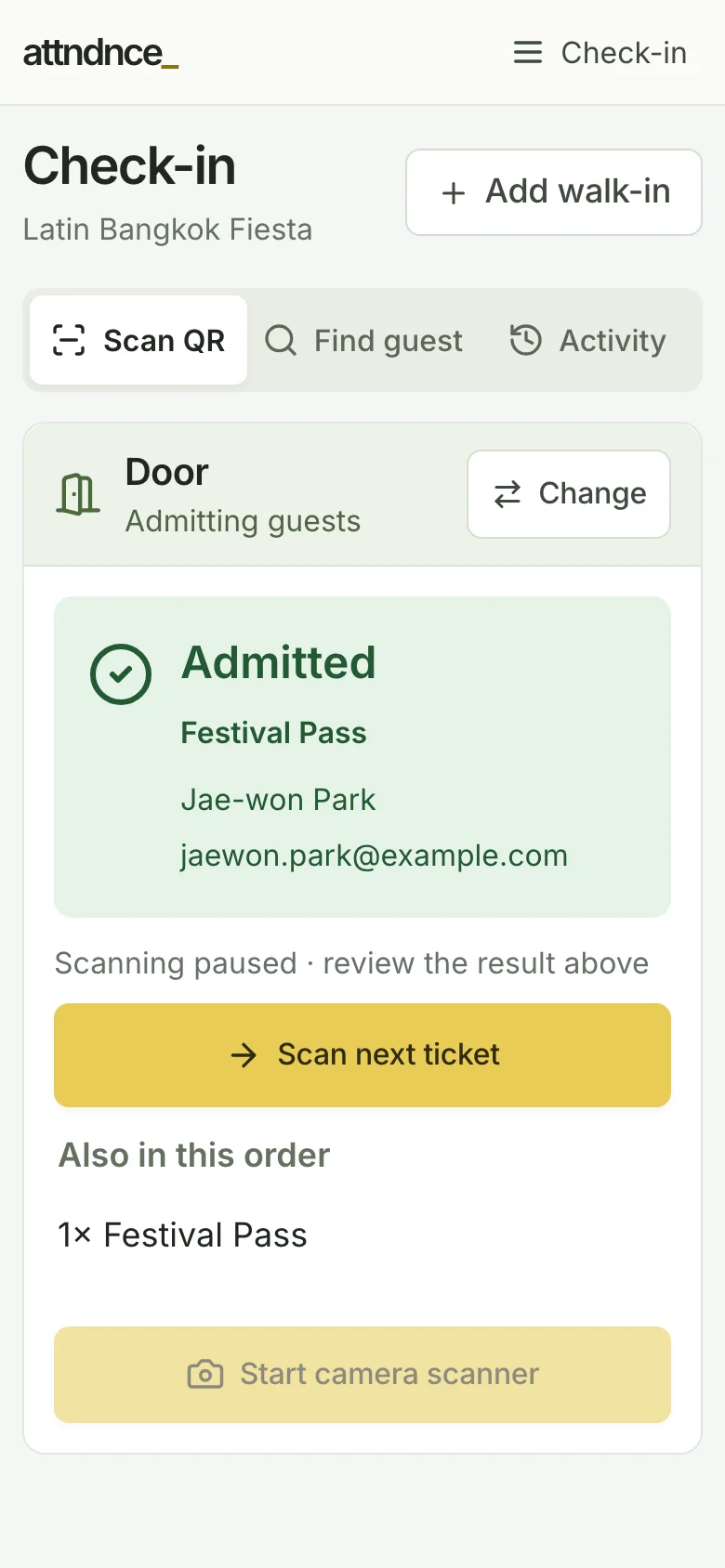 Staff phone check-in showing a successfully admitted festival pass with a demo guest